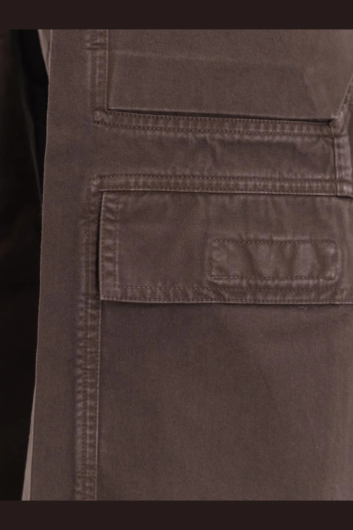 Dark brown denim cargo pants with reinforced stitching and two flap pockets from DRKSHDW men’s organic cotton trousers