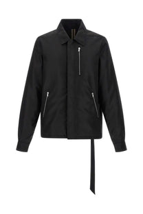 Drkshdw men’s black utility jacket with silver zippers and distinctive asymmetrical tie at the hem