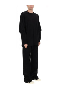Drkshdw men’s jeans geth black oversized long-sleeve top with layered flowing fabric and relaxed fit front view