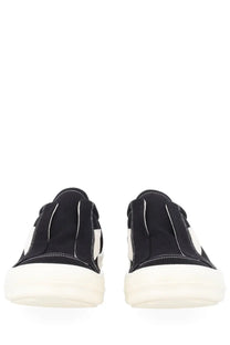 Drkshdw men’s laceless vintage black canvas slip-on sneakers with white rubber soles and contrasting white stitching