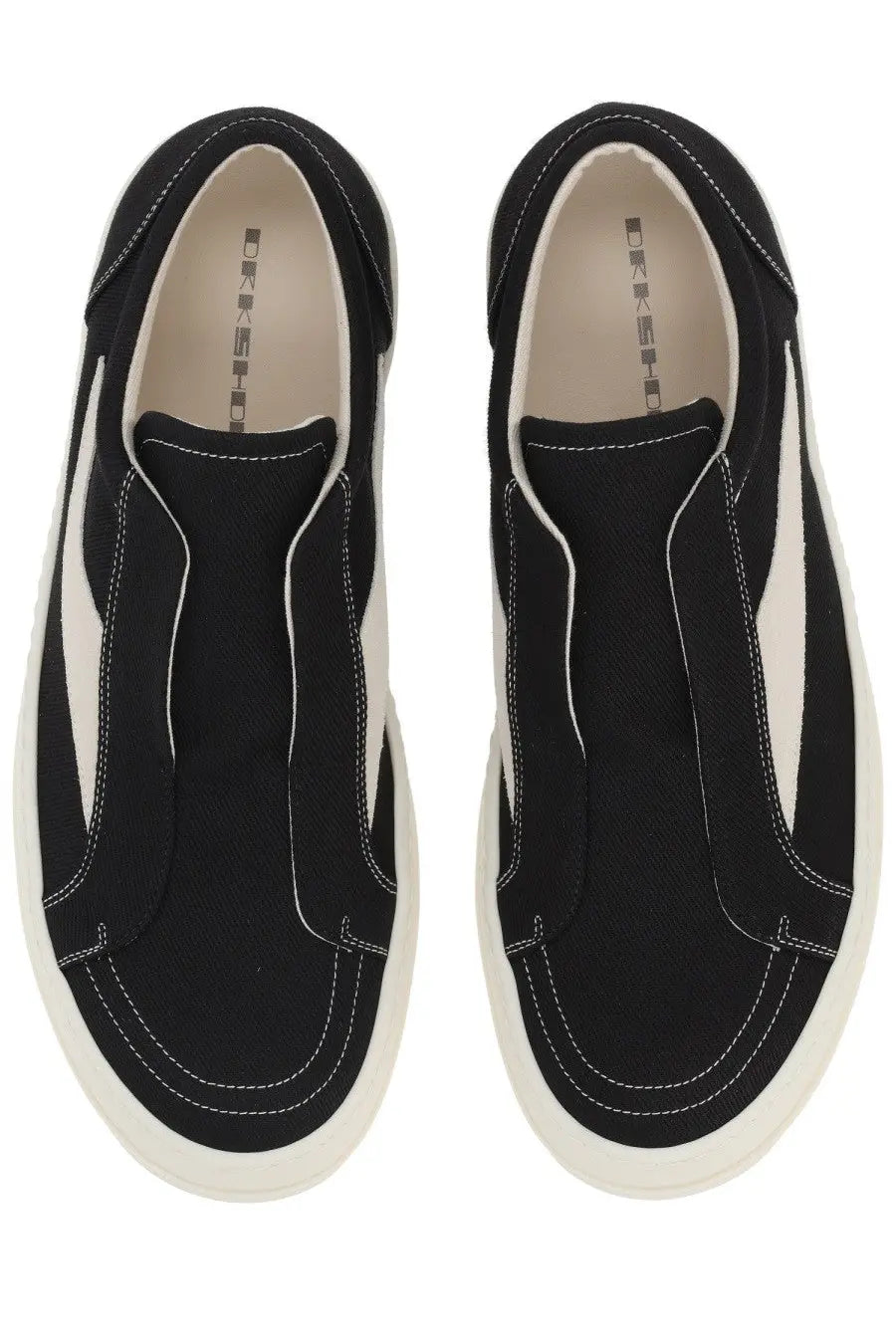 Drkshdw men’s black canvas slip-on sneakers with white rubber soles and contrasting stitching in laceless vintage style