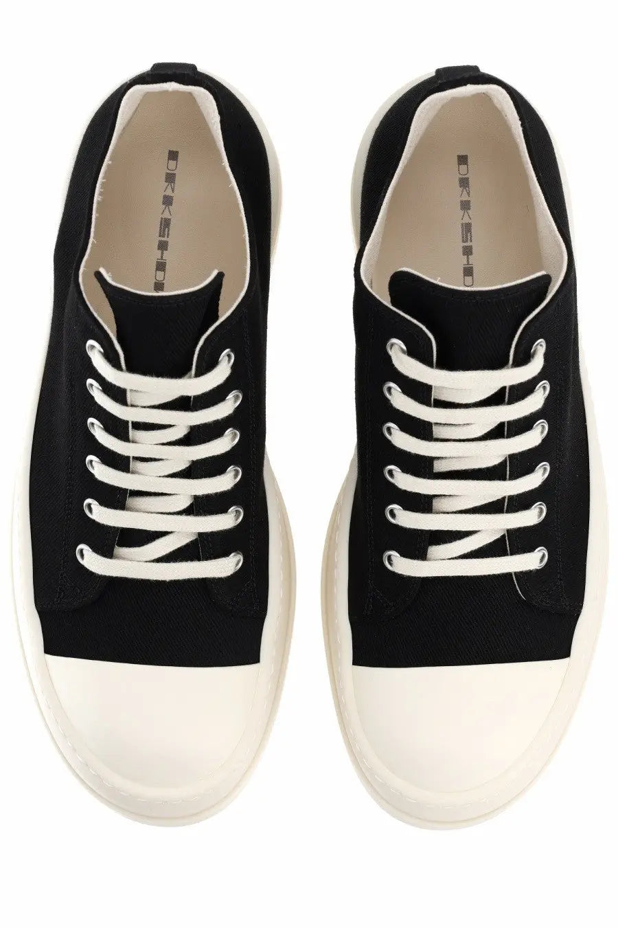 Drkshdw men’s mega bumper low sneaks sneaker black canvas with white rubber toe caps and laces minimalist design
