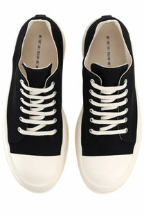 Drkshdw men’s mega bumper low sneaks sneaker black canvas with white rubber toe caps and laces minimalist design