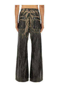 Drkshdw men’s wide-leg pants in black and brown camouflage with glossy distressed finish
