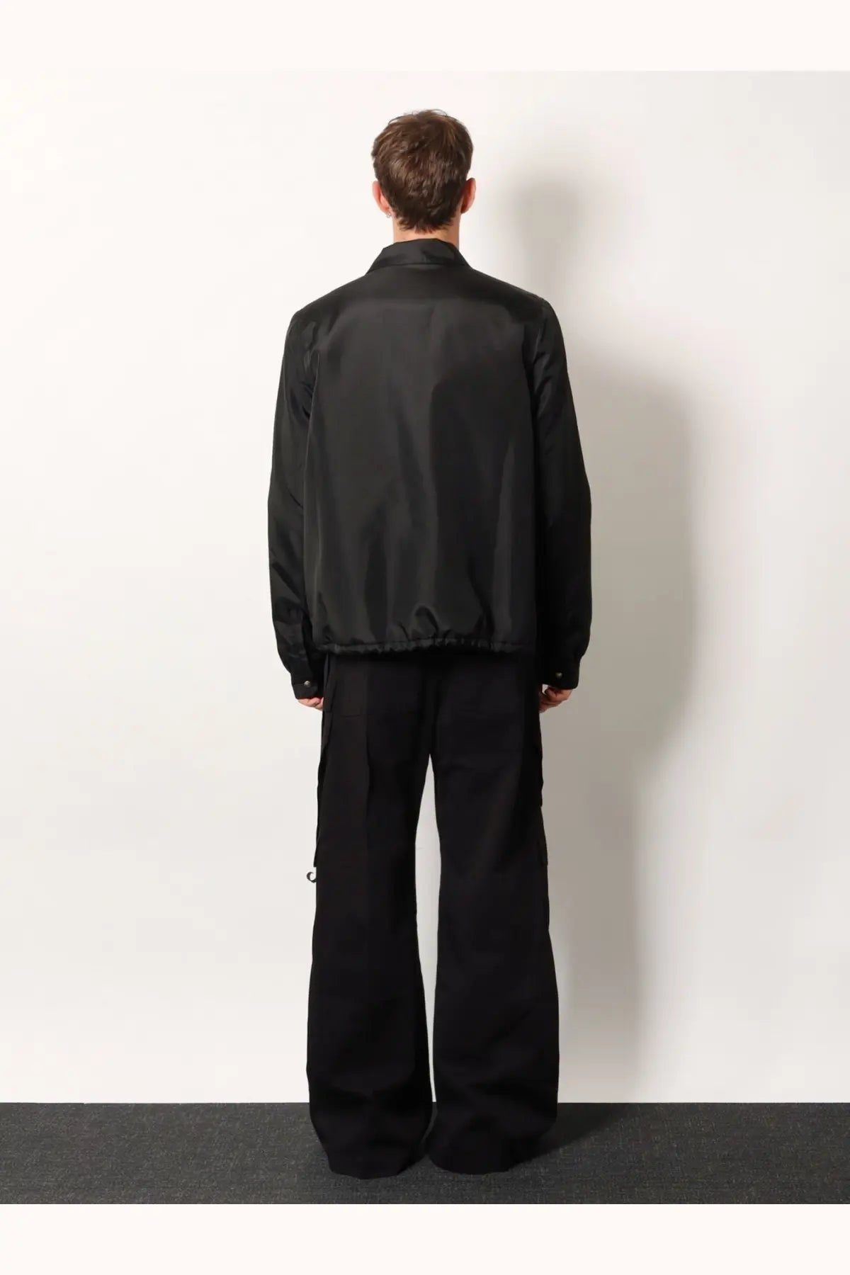 Drkshdw men’s black satin bomber jacket with glossy finish and subtle seam detailing made of recycled nylon