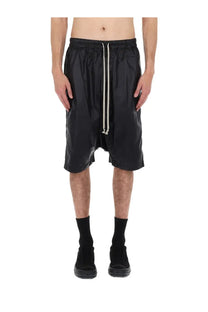 Drkshdw men’s black glossy nylon shorts with drawstring waist and asymmetrical hem for casual wear