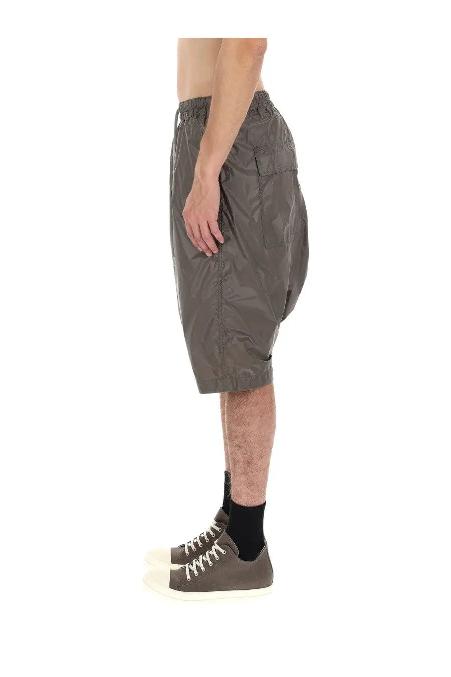 Olive green drkshdw men’s lightweight nylon shorts with relaxed fit and elastic waistband front view