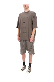 Oversized olive green t-shirt with black temple of love text printed vertically paired with drkshdw mens brown drawstring shorts
