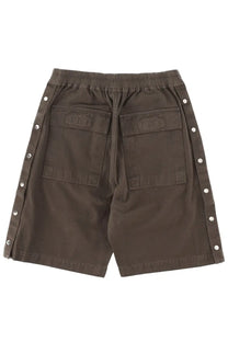 Dark olive green drkshdw men’s wide pusher shorts with silver snap buttons and large back cargo pockets shown from back