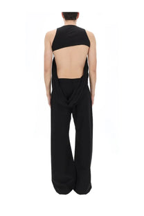 Black sleeveless jumpsuit with back cutout and wide leg pants shown from the back in DRKSHDW men’s top harness black
