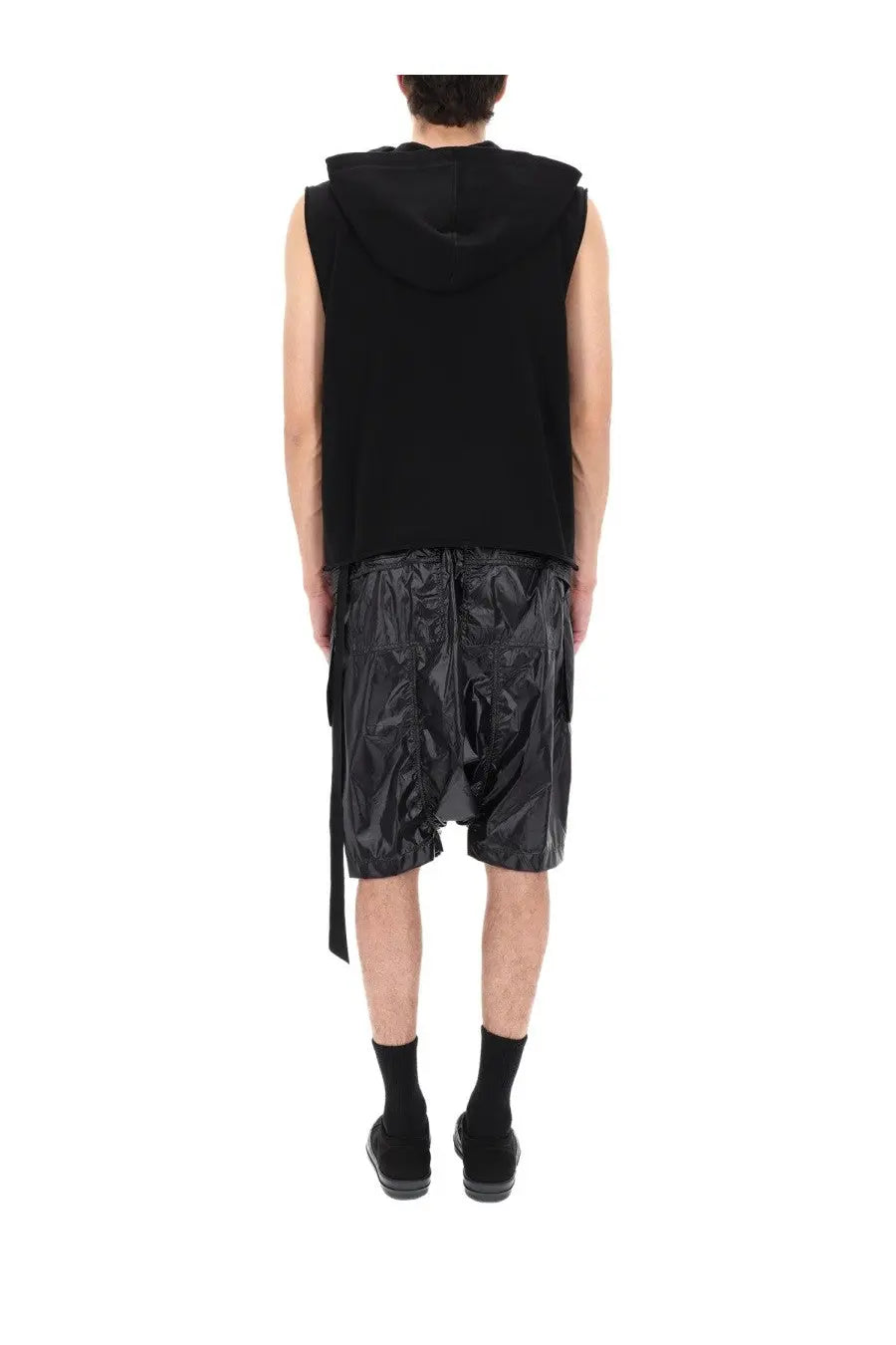 Black hooded sleeveless top with glossy reflective fabric and asymmetrical side slits by DRKSHDW men’s hooded tunic black