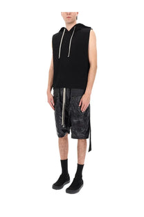 Drkshdw men’s black sleeveless hoodie with white drawstrings paired with glossy patterned black shorts