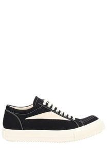Drkshdw men’s vintage denim sneaker black with black canvas, cream triangular panel, white laces, and thick off-white sole