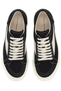 Drkshdw men’s vintage denim sneaker black featuring black canvas, white laces, cream side panels, and thick off-white sole