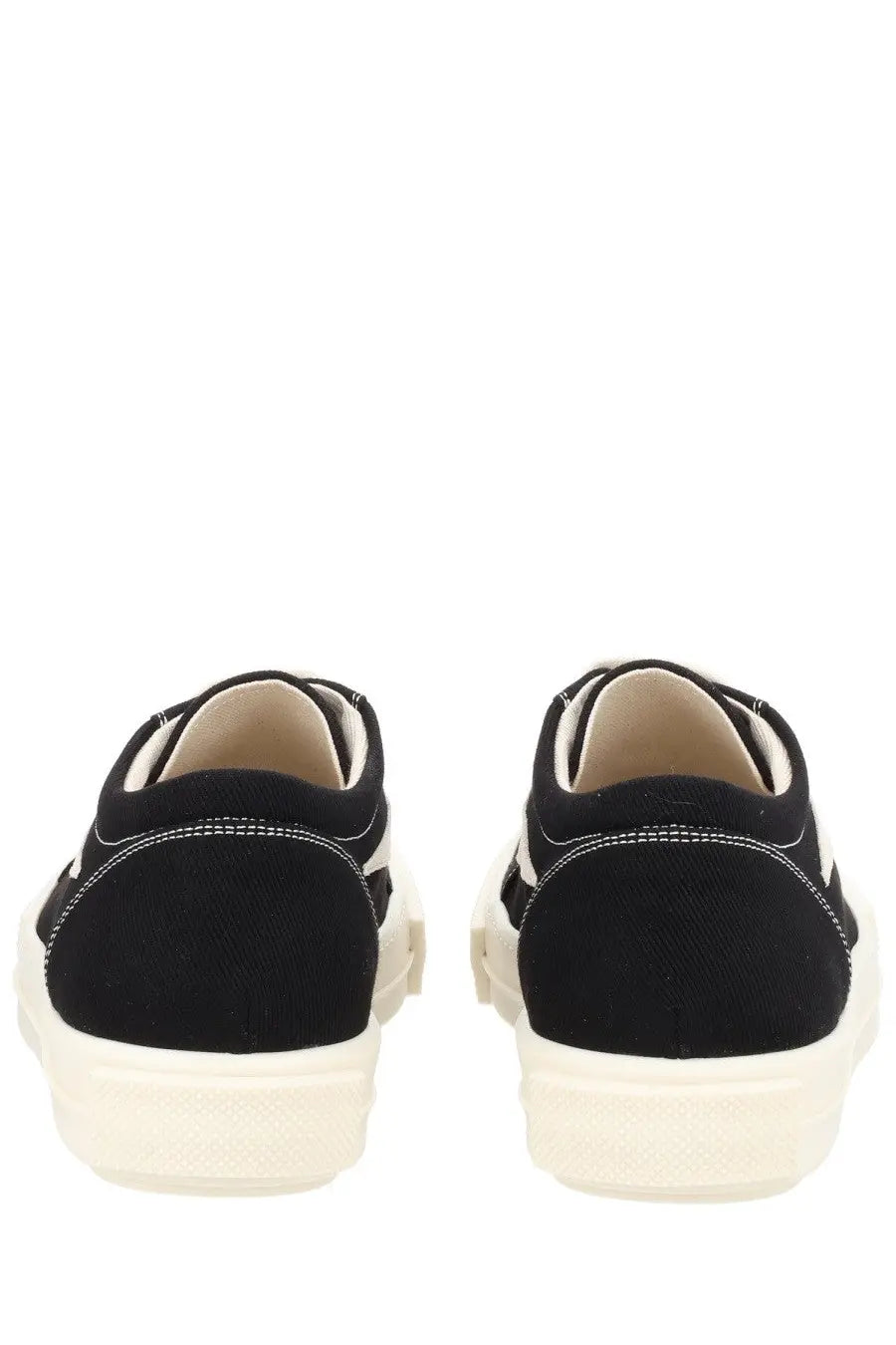 Drkshdw men’s vintage denim sneaker in black canvas with white rubber soles and contrasting white stitching
