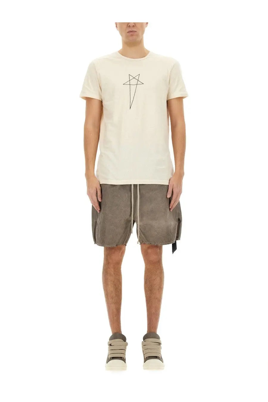 Cream-colored short-sleeved t-shirt with minimalist black inverted pentagram design paired with drkshdw mens beige zippered boxer shorts