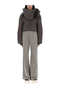 Dark gray drkshdw women’s convertible puffer jacket with voluminous hood and quilted design in bronze finish