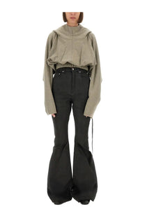 Drkshdw women’s olive green cropped hoodie with long sleeves and high collar paired with black flared pants