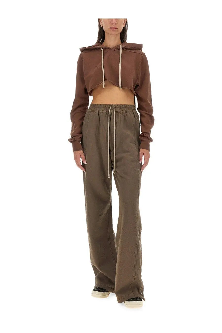 Drkshdw women’s brown cropped hoodie with cream drawstrings paired with wide-leg olive green trousers