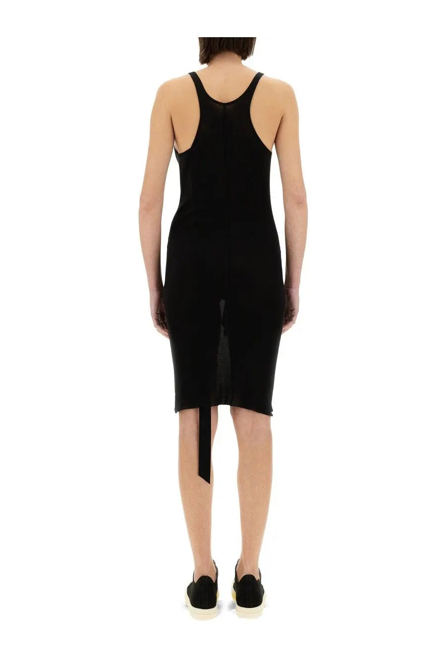 Back view of drkshdw women’s black sleeveless knit dress with back slit and asymmetrical hemline