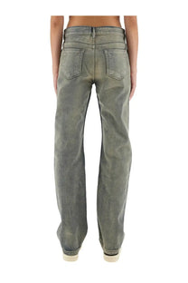 A pair of drkshdw womens wide-leg faded gray denim jeans with relaxed fit shown from the back side