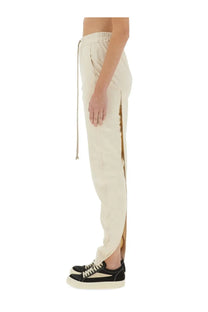 Cream-colored high-waisted joggers with side slit and drawstring waistband from drkshdw women’s pillar maxi skirt white collection