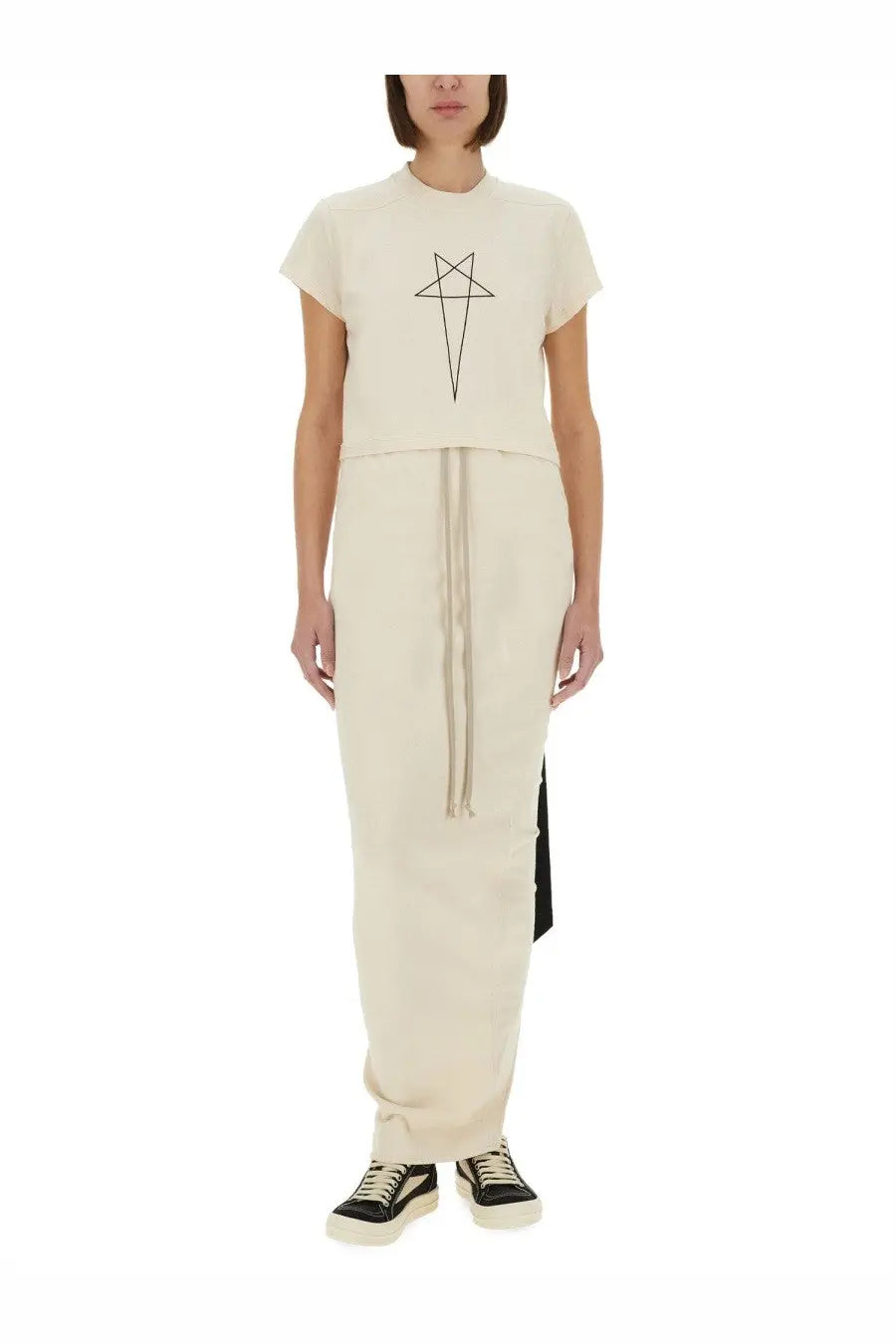 Cream-colored short-sleeved crop top with black geometric star design paired with DRKSHDW women’s white maxi skirt
