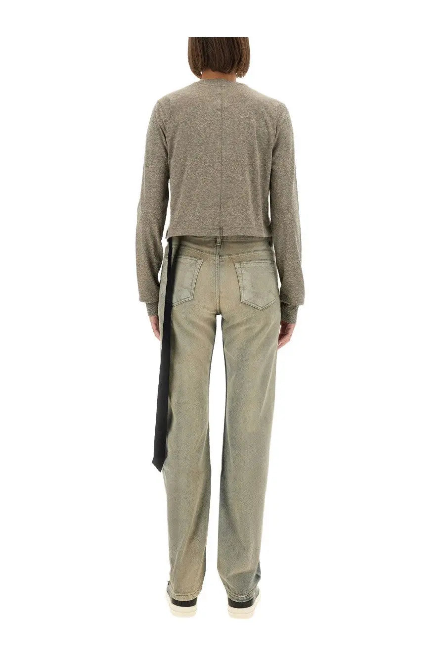 A model wears muted olive green wide-leg denim pants with a black fabric tie paired with drkshdw women’s cropped small level grey shirt back view
