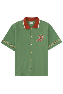 Drôle de Monsieur men’s green short-sleeved polo shirt with red and white collar gold buttons and embroidered red d on chest