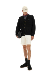 Drôle de Monsieur men’s black cardigan with gold buttons and small embroidered logo on the left chest