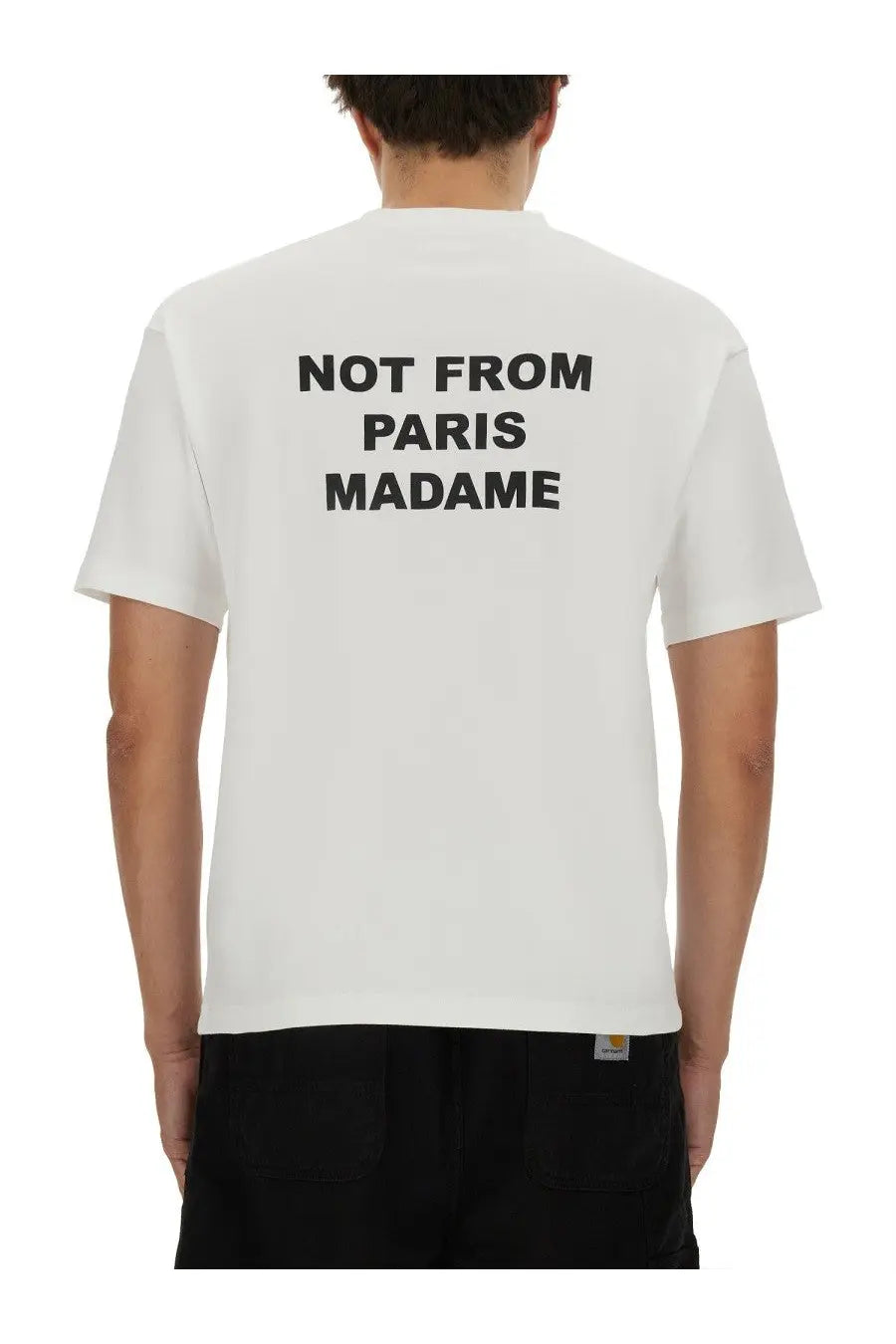 Back of drôle de monsieur men’s white cotton t-shirt with bold black not from paris madame text printed across the back