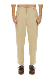Drôle de monsieur men’s cropped khaki chino trousers with pleats and a clean tailored fit in beige