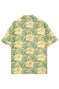 Drôle de Monsieur men’s green hibiscus monogramme shirt with yellow hibiscus flowers and swirling vine pattern