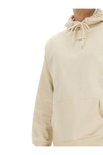 Beige cotton hoodie with drawstring hood and front pocket from drôle de monsieur menswear collection