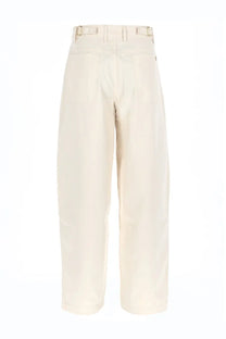 Cream-colored wide-leg trousers with minimalist design and metallic belt loops from drôle de monsieur men’s pantalon ballon white