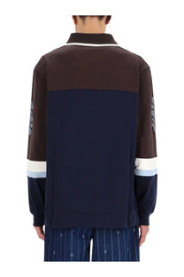Drôle de monsieur men’s polo shirt racing blue with brown and navy color-blocking and striped cuffs with embroidery