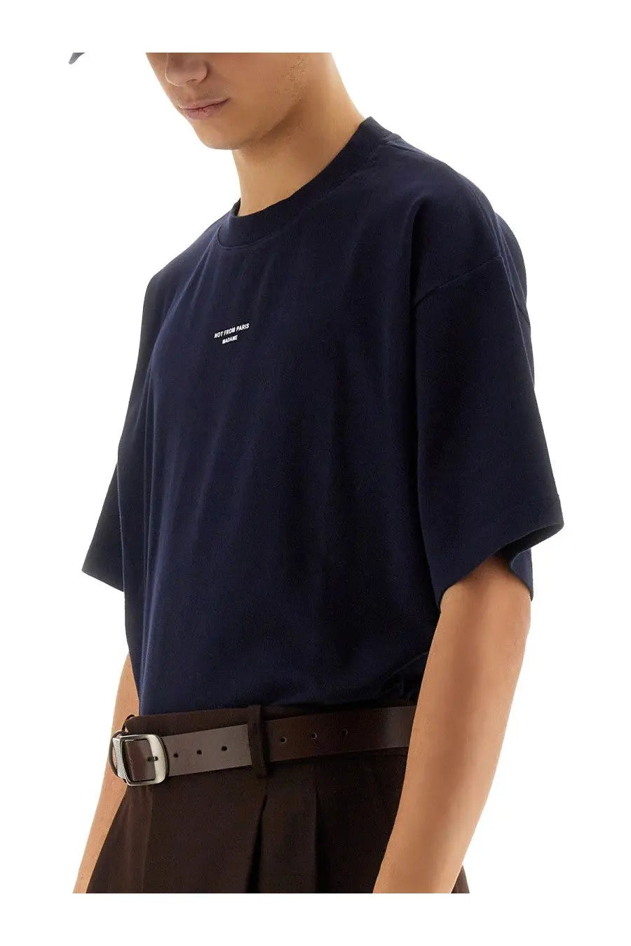 Navy blue oversized cotton t-shirt with small white text logo on left chest from Drôle de Monsieur men’s slogan shirt blue