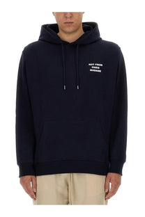 Black hooded sweatshirt with white not from paris madame text on chest from drôle de monsieur men’s slogan sweatshirt blue