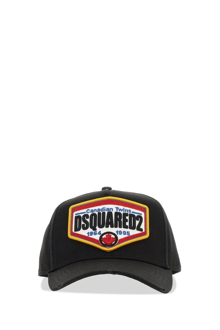 Black Dsquared2 men’s baseball cap featuring a bold embroidered patch with red white and yellow accents
