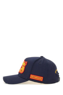 Dsquared2 men’s navy blue baseball cap with yellow red shield patch and orange brotherhood label on the side