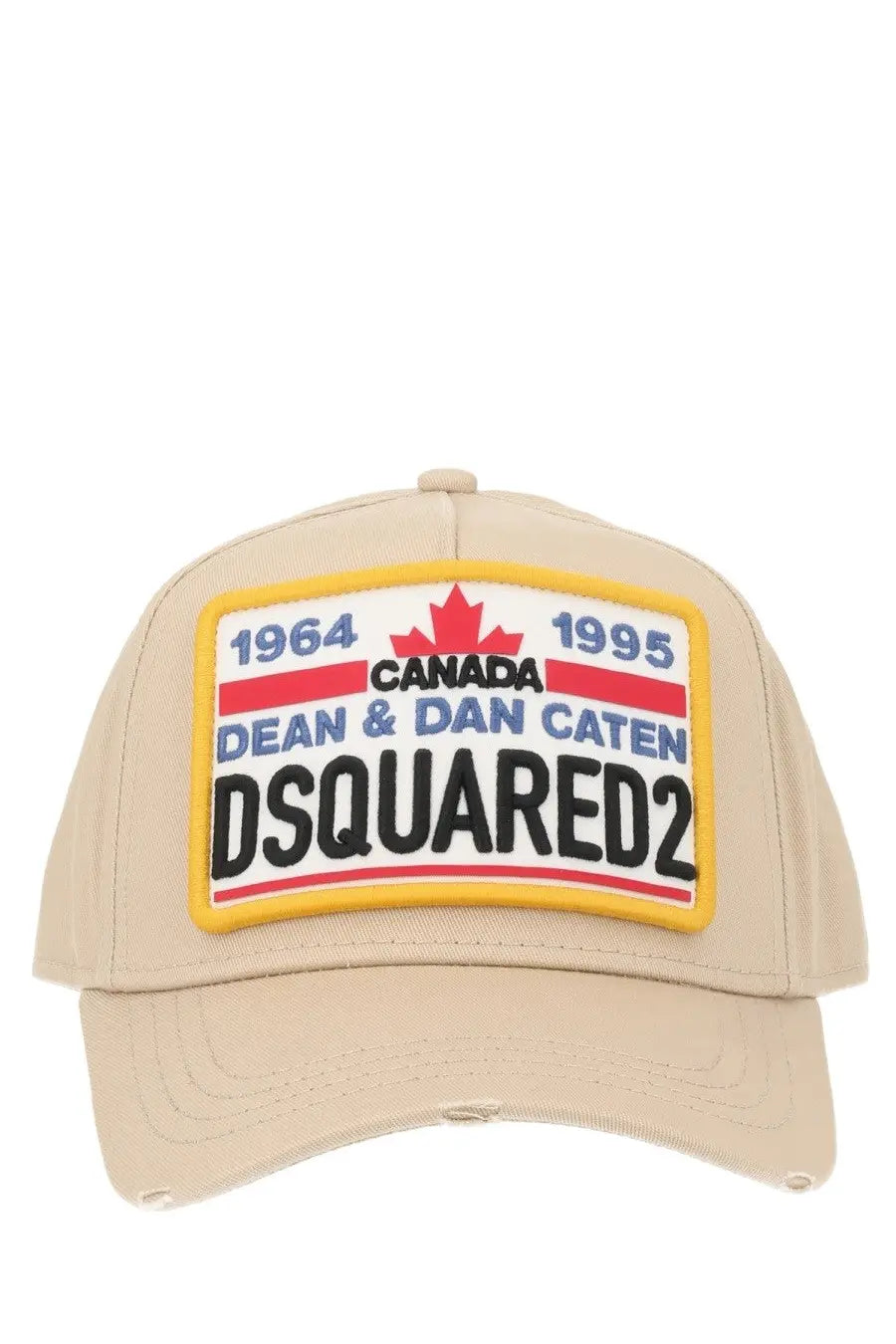 Beige dsquared2 men’s baseball hat with bold embroidered red white and blue patch featuring maple leaf emblem