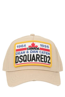 Beige dsquared2 men’s baseball hat with bold embroidered red white and blue patch featuring maple leaf emblem