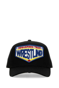 Black Dsquared2 men’s baseball hat featuring a bold embroidered wrestling patch with blue, yellow, and red details