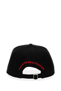 Back side of dsquared2 men’s black baseball hat with red embroidered born to be a fighter text and silver metal buckle