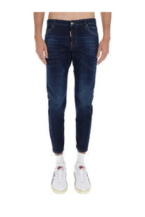Dark indigo slim-fit cotton denim jeans with subtle fading and dsquared2 logo on back pocket in mens blue style