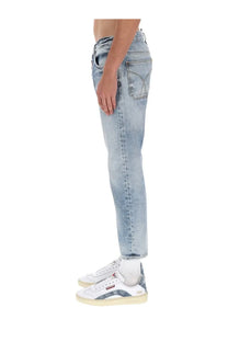 Dsquared2 men’s light-wash cotton denim jeans with slim fit and faded detailing in blue color