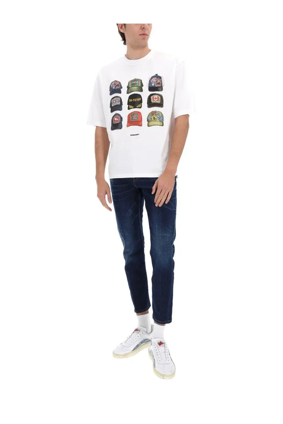 White t-shirt with colorful baseball cap grid graphic paired with Dsquared2 men’s blue cotton denim jeans