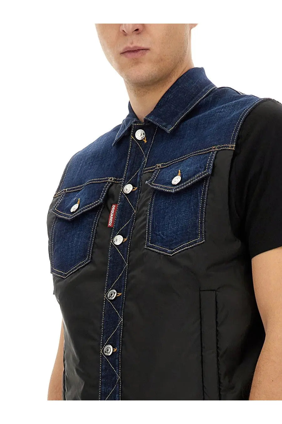 Dsquared2 men’s denim puffer vest in dark blue with black quilted panels and silver toned buttons