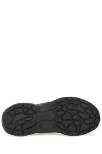 Black rubber sole with textured geometric tread and molded branding on dsquared2 men’s faster sneaker green