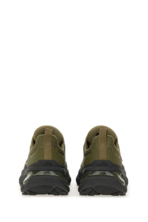 Dsquared2 men’s olive green slip-on sneakers with chunky black sole and transparent air cushioning units